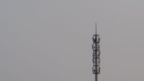 Self Support, Guyed Tower, Guyed Mast, Pole. Telecommunication Tower. Cell Phone Signal Tower on sky background stock photos Self Support, Guyed Tower, Guyed Mast, Pole. Telecommunication Tower. Cell Phone Signal Tower on sky background stock photos