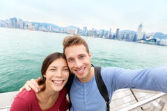 Selfie - Tourists couple taking picture Hong Kong royalty free stock photography Selfie - Tourists couple taking picture Hong Kong royalty free stock photography