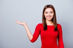 Selling Time, Discounts For 14 February, Nice, Cute Woman Showing Copy Space On Her Palm, Looking At Camera, Standing Over Gray B Royalty Free Stock Image Selling Time, Discounts For 14 February, Nice, Cute Woman Showing Copy Space On Her Palm, Looking At Camera, Standing Over Gray B Royalty Free Stock Image