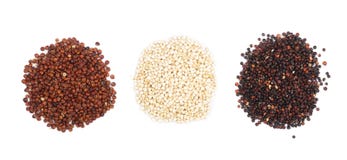 Semillas rojas y blancas negras de la quinoa aisladas en el fondo blanco Visión superior Foto de archivo Semillas rojas y blancas negras de la quinoa aisladas en el fondo blanco Visión superior Foto de archivo