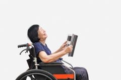 Senior asian woman laughing while reading magazine royalty free stock photography Senior asian woman laughing while reading magazine royalty free stock photography