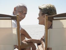 Senior Couple On Deckchairs At Beach Royalty Free Stock Photo Senior Couple On Deckchairs At Beach Royalty Free Stock Photo