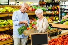 Senior couple doing some shopping together Stock Photo Senior couple doing some shopping together Stock Photo