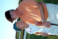Senior couple golf