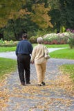 Senior Couple In Park Royalty Free Stock Photos