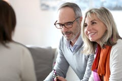 Senior couple meeting banker Royalty Free Stock Images Senior couple meeting banker Royalty Free Stock Images