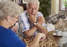 Senior couple playing chess royalty free stock images Senior couple playing chess royalty free stock images