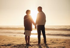 Senior couple standing on a beach together Royalty Free Stock Image Senior couple standing on a beach together Royalty Free Stock Image