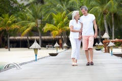 Senior Couple Walking On Wooden Jetty Stock Photography Senior Couple Walking On Wooden Jetty Stock Photography