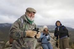 Senior Male Hiker Holding Binoculars royalty free stock image Senior Male Hiker Holding Binoculars royalty free stock image