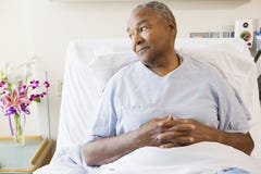 Senior Man Sitting In Hospital Bed royalty free stock images Senior Man Sitting In Hospital Bed royalty free stock images