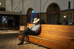 Senior Man Waiting in Train Station
