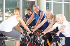 Senior people with trainer in gym stock photography Senior people with trainer in gym stock photography