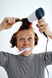 Senior woman brushing teeth royalty free stock image Senior woman brushing teeth royalty free stock image