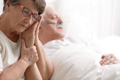 Senior woman holding her husband`s hand stock photos Senior woman holding her husband`s hand stock photos
