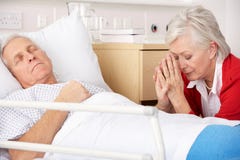 Senior woman with seriously ill husband