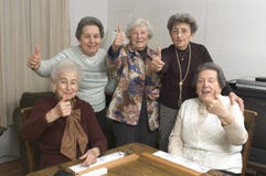Senior women at the game table