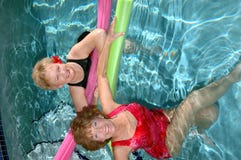 Seniors friends swimming pool