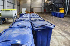 Separate garbage collection. Equipment for pressing debris sorting material to be processed in a modern waste recycling plant stock photos Separate garbage collection. Equipment for pressing debris sorting material to be processed in a modern waste recycling plant stock photos
