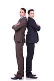 Serious business men standing back to back royalty free stock image Serious business men standing back to back royalty free stock image
