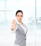 Serious business woman making stop hand sign stock photo Serious business woman making stop hand sign stock photo