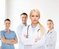Serious female doctor with stethoscope royalty free stock image Serious female doctor with stethoscope royalty free stock image