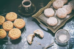 Sesame shortbread with date stuffing. Middle Eastern cookies. Eid and Ramadan Dates Sweets. Kahk. Arabian cuisine. Copy Space royalty free stock photos Sesame shortbread with date stuffing. Middle Eastern cookies. Eid and Ramadan Dates Sweets. Kahk. Arabian cuisine. Copy Space royalty free stock photos