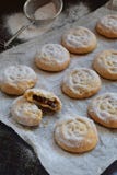 Sesame shortbread with date stuffing. Middle Eastern cookies. Eid and Ramadan Dates Sweets. Kahk. Arabian cuisine. Copy Space stock image Sesame shortbread with date stuffing. Middle Eastern cookies. Eid and Ramadan Dates Sweets. Kahk. Arabian cuisine. Copy Space stock image