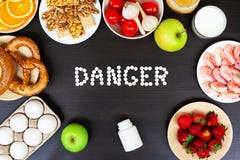 Set of allergy food with antihistamine pills on wooden table royalty free stock photos Set of allergy food with antihistamine pills on wooden table royalty free stock photos