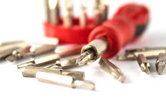 A set of bits for screwdrivers on a white background stock photo A set of bits for screwdrivers on a white background stock photo