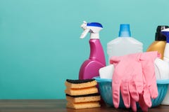 Set of cleaning and washing equipment on wooden table. Cleaning concept with supplies royalty free stock photography Set of cleaning and washing equipment on wooden table. Cleaning concept with supplies royalty free stock photography