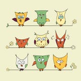 Set of cute cartoon owls on a yellow background stock illustration Set of cute cartoon owls on a yellow background stock illustration