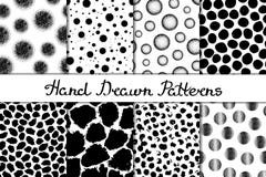 Set of eight seamless textures. Patterns with spheres, round and oval elements and spots. Abstract forms drawn a wide pen and ink. Stock Image Set of eight seamless textures. Patterns with spheres, round and oval elements and spots. Abstract forms drawn a wide pen and ink. Stock Image