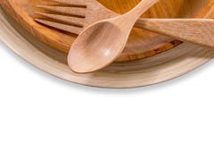 Set of fork,spoon and dish wood isolated over white royalty free stock photos Set of fork,spoon and dish wood isolated over white royalty free stock photos