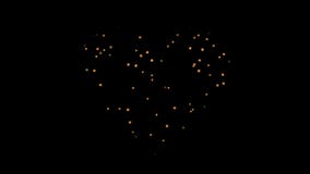 Set of gold fireworks in the shape of a hearts. Alpha channel