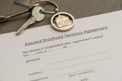 Set of Keys and tenancy agreement document stock image Set of Keys and tenancy agreement document stock image