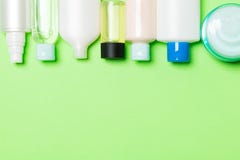 Set Of Cream And Cosmetics Bottles And Jars On Green Background. Bodycare Concept With Empty Space For Your Design Royalty Free Stock Photo Set Of Cream And Cosmetics Bottles And Jars On Green Background. Bodycare Concept With Empty Space For Your Design Royalty Free Stock Photo