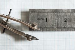 Set Of Drawing Instrument And Rulers On Graph Paper Royalty Free Stock Photos