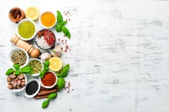 Set Of Indian Spices, Basil And Herbs On A White Wooden Background. Stock Photography