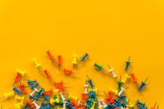 Set of push pins in different colors. Thumbtacks. Top view. on Yellow background stock image Set of push pins in different colors. Thumbtacks. Top view. on Yellow background stock image