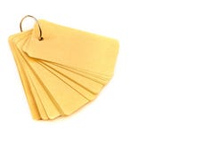 Set of recycled label tags tied with a metal ring to a notepad isolated on white background royalty free stock image Set of recycled label tags tied with a metal ring to a notepad isolated on white background royalty free stock image