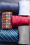 Set of six multicolored rolled up males ties. View from above royalty free stock image Set of six multicolored rolled up males ties. View from above royalty free stock image