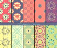 Set of ten seamless pattern with mandalas in beautiful colors. Vector background stock illustration Set of ten seamless pattern with mandalas in beautiful colors. Vector background stock illustration