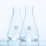 Set of two empty temperature resistant conical flasks for measurments Stock Photography Set of two empty temperature resistant conical flasks for measurments Stock Photography