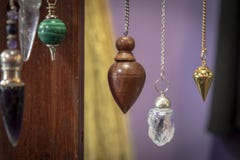 Several Beautiful Crystal Pendulums Hanging on Display royalty free stock images Several Beautiful Crystal Pendulums Hanging on Display royalty free stock images