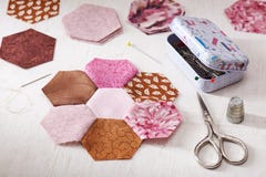 Sewing of hexagon pieces of fabric a quilt Grandmother`s Flower Garden royalty free stock photography Sewing of hexagon pieces of fabric a quilt Grandmother`s Flower Garden royalty free stock photography