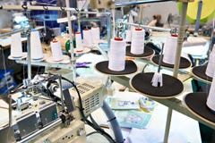 Sewing workshop with threads and electric machines stock photos Sewing workshop with threads and electric machines stock photos