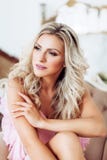 Sexy beautiful blonde woman in pink underclothes stock photos Sexy beautiful blonde woman in pink underclothes stock photos