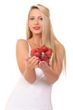 Beautiful young blond woman with strawberry royalty free stock photography Beautiful young blond woman with strawberry royalty free stock photography