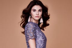 Sexy beauty fashion model brunette hairstyle curly wear lilac su Stock Images Sexy beauty fashion model brunette hairstyle curly wear lilac su Stock Images